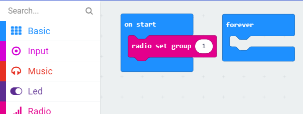 MakeCode workspace showing the &ldquo;radio set group&rdquo; block in the &ldquo;on start&rdquo; block